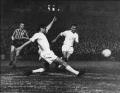 The brilliant Johnny Byrne, left, watches Madrid defender Casado clear in this floodlit friendly. Visitors Real won 4-3 with a star-studded line-up in front of 26000 at Selhurst Park