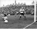 Palace's Alan Woan watches in horror as Barrow keeper Fullerton diverts a cross round the post with his knees. Palace won 4-2 with Woan getting the first.