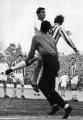 Here's Cliff Holton, also in yellow gloves, taking on the Seagull defence in January 1963. Palace won 2-1.